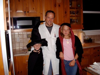 Me with my two kids dressed up for the final Harry Potter book release a couple of years ago.  Professor McGonagall next to me won the 8 year and under age group.  ;-)  Points to anyone who can tell who I was from the books.  ;-)