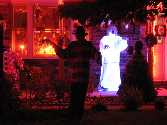 Here's a snap I liked because you can see my new glowing vampire ghost, and I liked the way Freddie is silhouetted against the orange lights.
